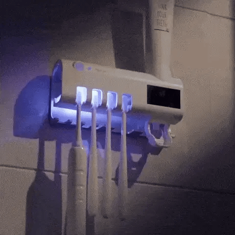 Close-up of the KOAKI sterilizer holding toothbrushes